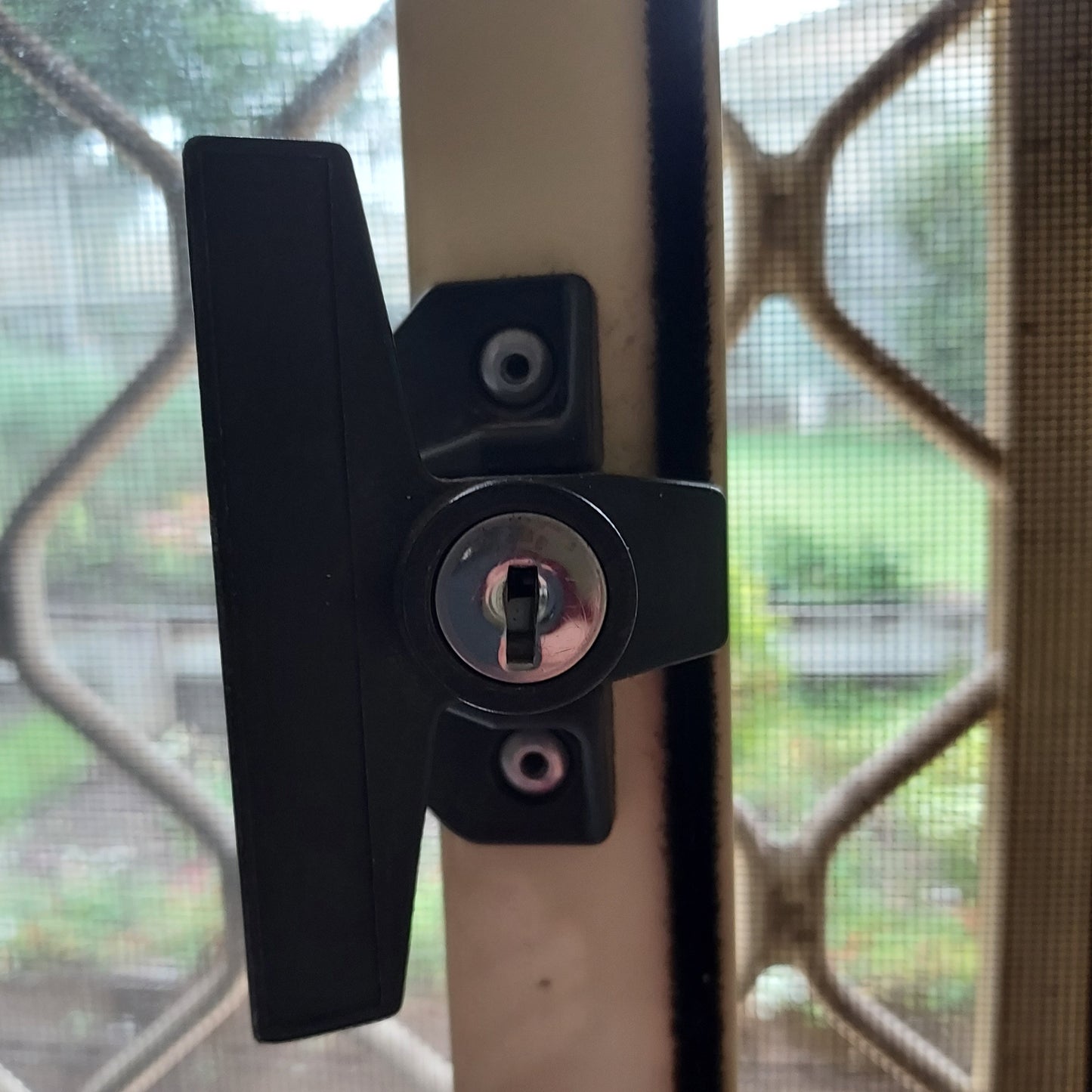 Sliding window latch catch handle - surface mounted